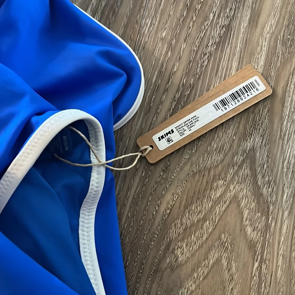 skims sporty zipper swim strapless one piece